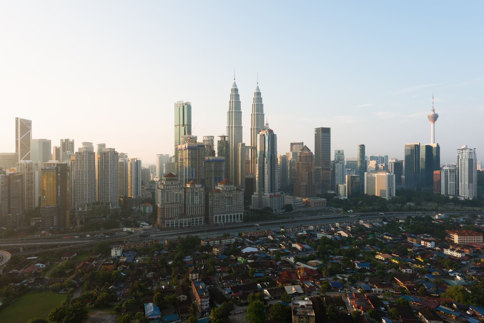The Kuala Lumpur skyline, with the Petronas Towers and KL Tower above the city